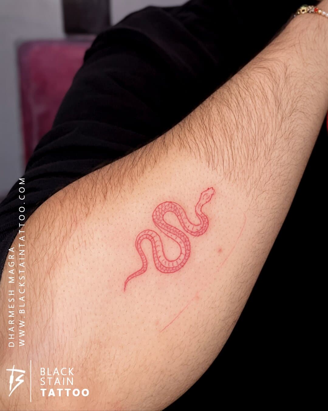 Colorful red snake tattoo design - tattoo artist Ahmedabad