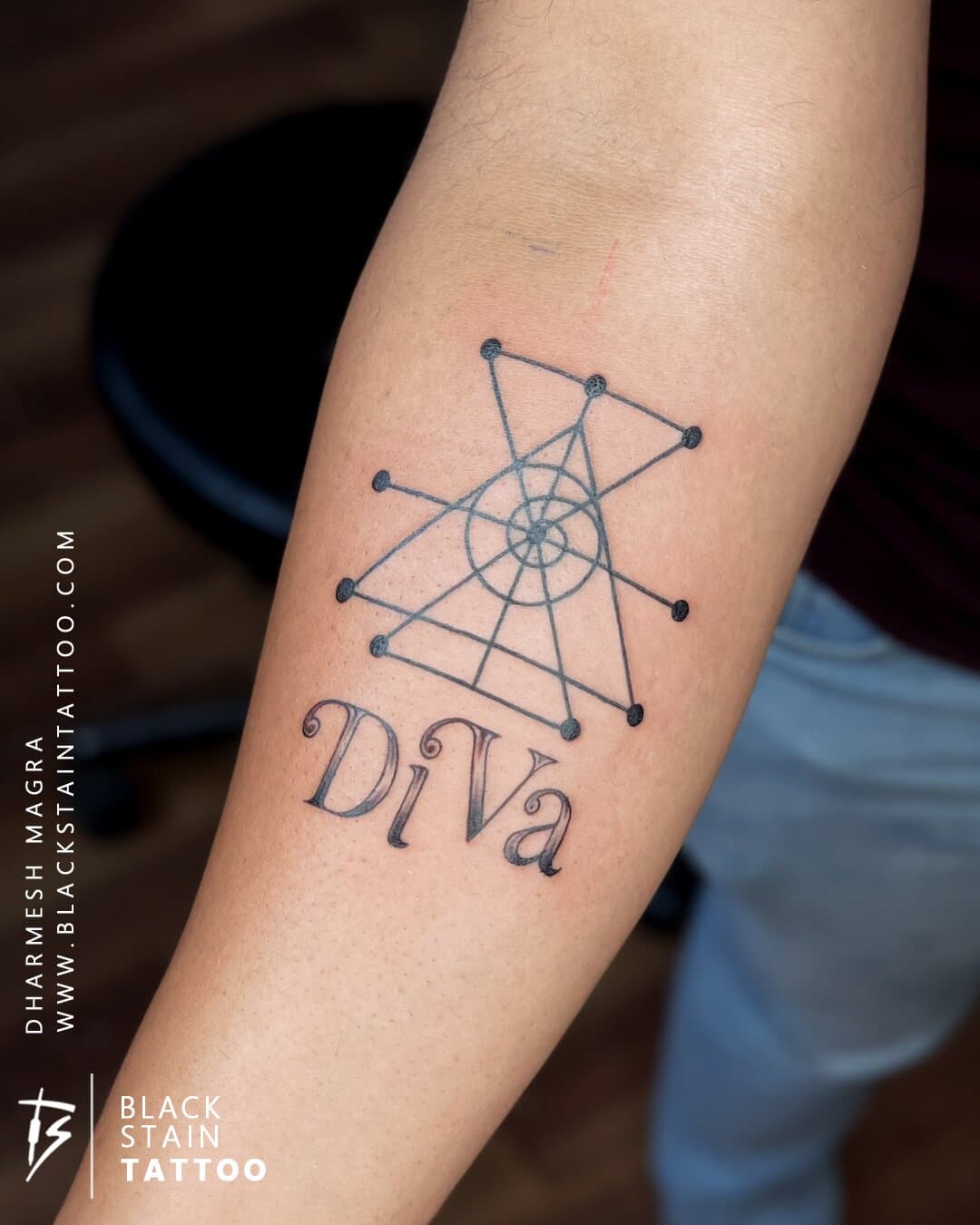 Sacred geometry diva tattoo with dot work design - geometric tattoo artist Ahmedabad